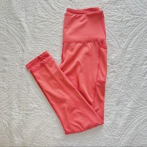 Bright coral pink high waisted leggings with pockets